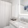 a bathroom with a white shower curtain