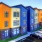 a row of colorful buildings