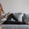 a person sitting on a couch