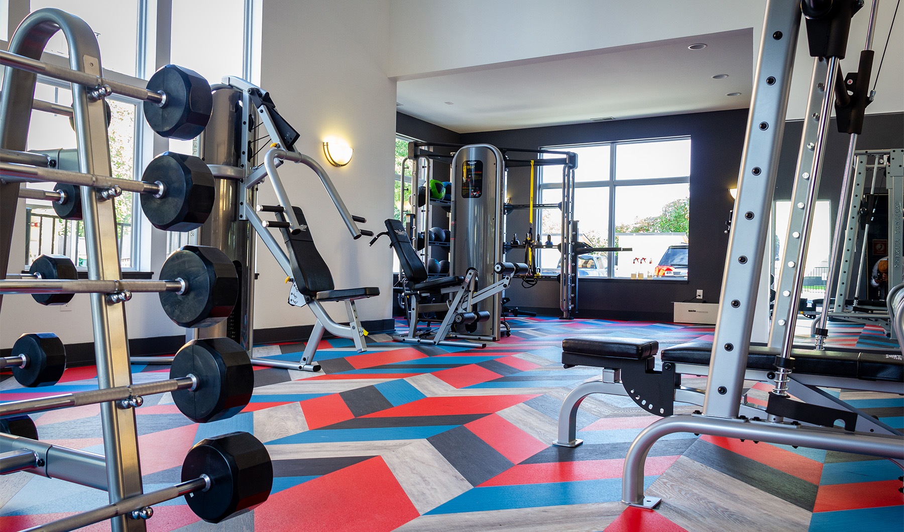 Cutting-edge amenities at your fingertips a gym with exercise equipment