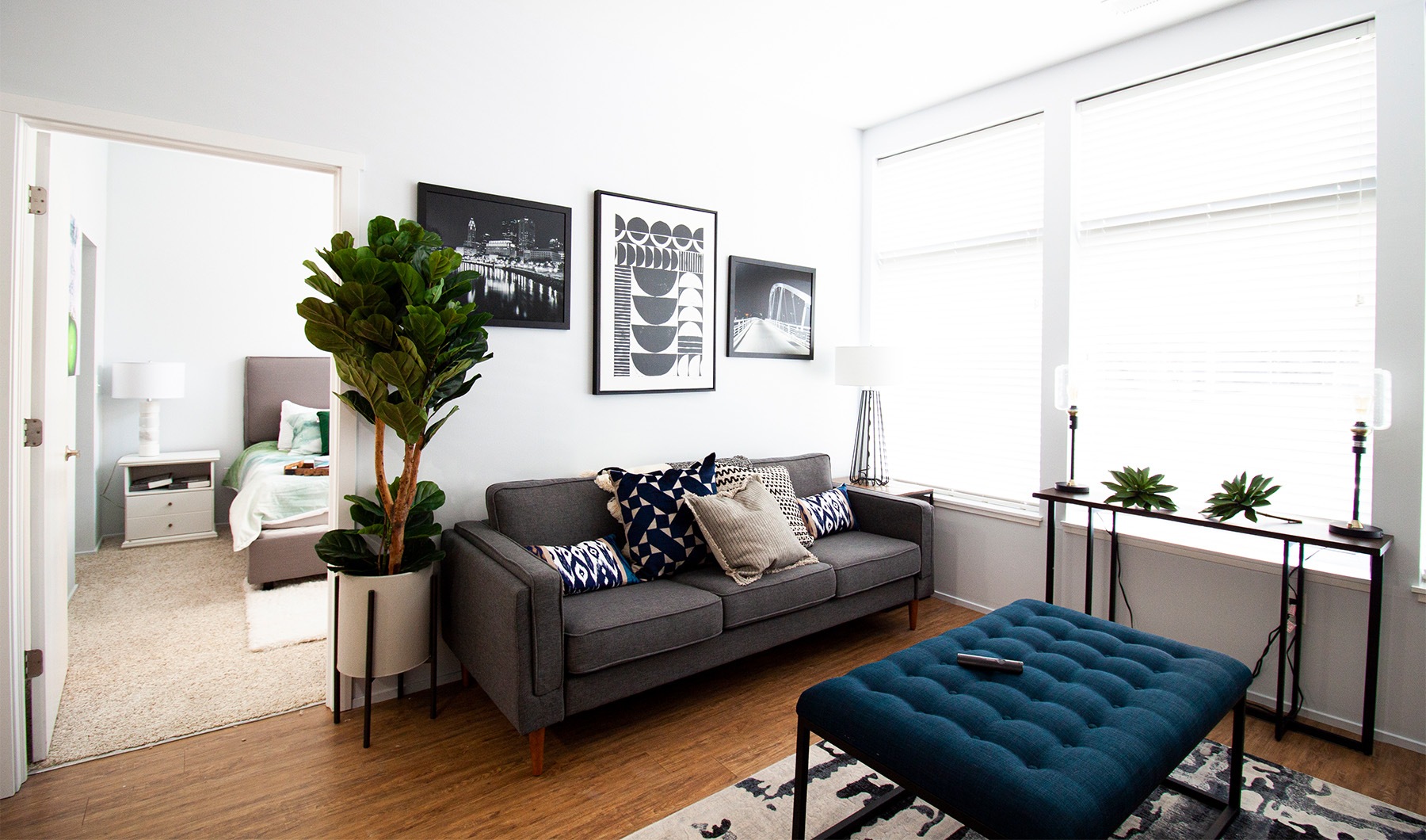 a living room with a couch and a table