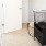 a room with a bed and a door